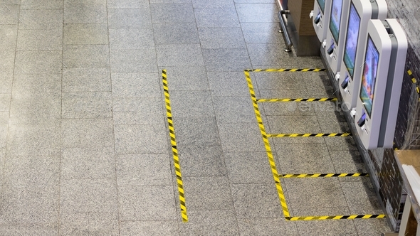 Secure marking of yellow lines on floor - measures for social distancing near self-service checkout