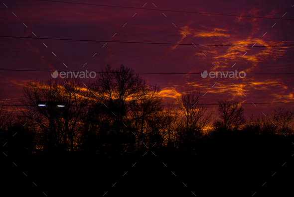 Beautiful Sunrise viewed from parking lot - Stock Photo - Images