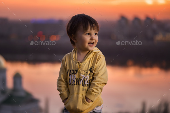 Child at sunset  - Stock Photo - Images