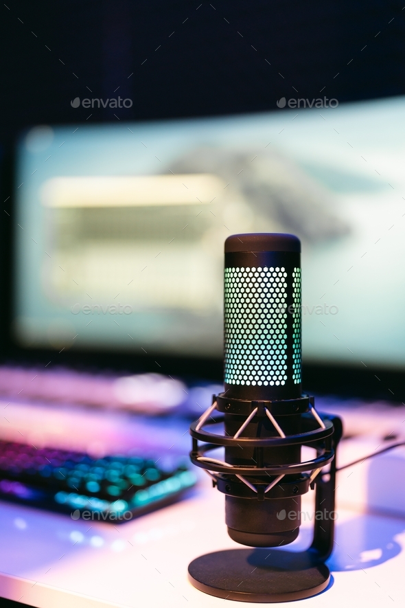 Modern creative sound studio background with microphone and neon lights ...