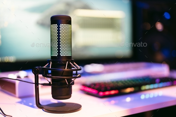 Modern creative sound studio background with microphone and neon lights ...