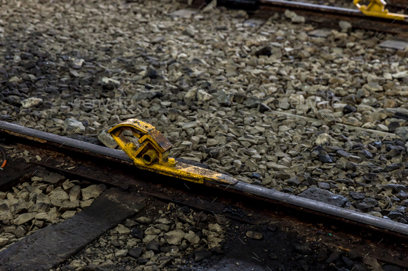 Train stopper or Train bumper installed on track for break. Stock Photo ...