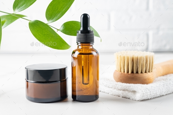 Set of home SPA cosmetic products. Dry Brush, Organic Oil, Towel. Anti-cellulite brush for dry body