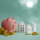 Piggy bank with gold coin and model house. Saving money for house concept, 3D render - PhotoDune Item for Sale