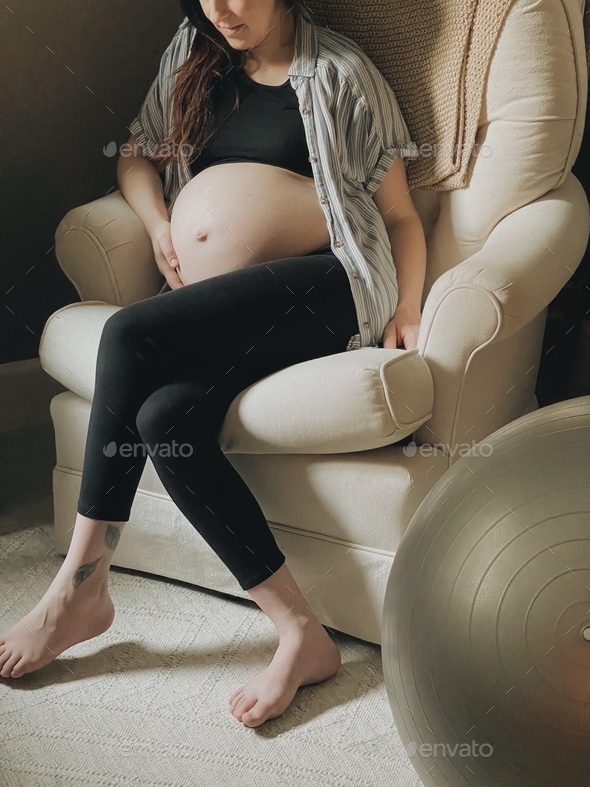 Young woman in her last days before giving birth - Stock Photo - Images