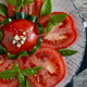 side dish ripe red tomatoes sliced with oil, oregano and garlic - PhotoDune Item for Sale