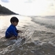 kid playing sea, sea, sunset, beach, sand, happy, lifestyle - PhotoDune Item for Sale