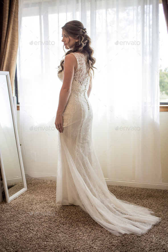 Beautiful bride in final preparations for the wedding ceremony - Stock Photo - Images