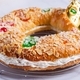 Traditional Spanish Epiphany cake, Roscon de Reyes with festive decorations - PhotoDune Item for Sale