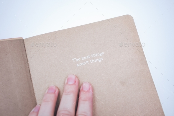 A quote in a journal that says, the best things aren’t things.