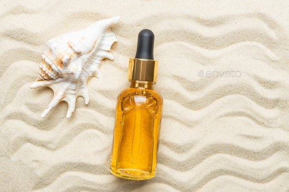 oil serum essence in glass bottle flatlay. Natural cosmetic, beauty skin care. Sunscreen oil
