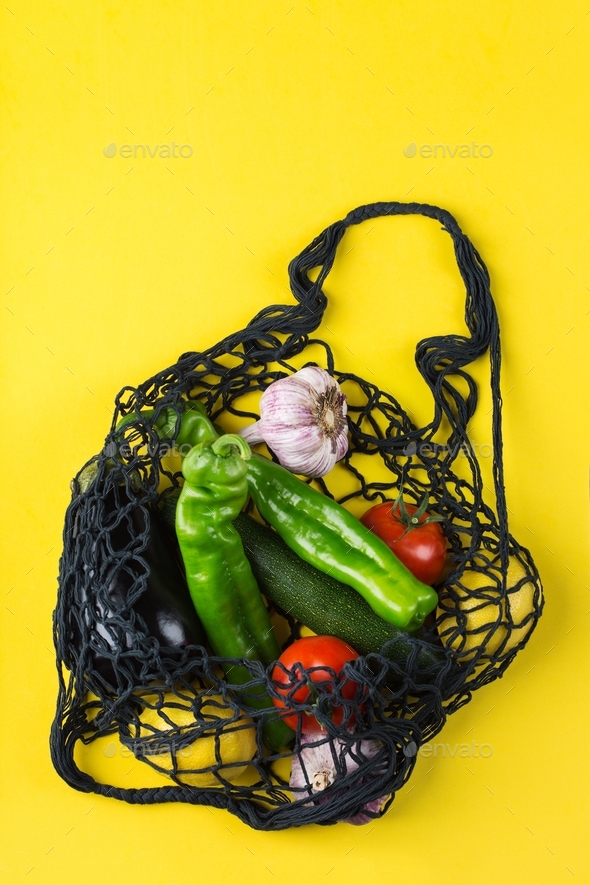 Mesh bag with vegetables. Zero waste, plastic free concept - Stock Photo - Images