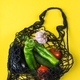 Mesh bag with vegetables. Zero waste, plastic free concept - PhotoDune Item for Sale