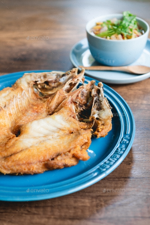 Deep fried fish, Thai style with spicy sauce Stock Photo by wikornr