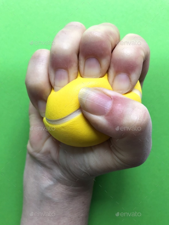 Stress Relief. : Stress ball in a clenched fist