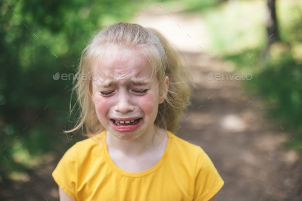 Unhappy preteen girl crying Stock Photo by olesyaklyots | PhotoDune