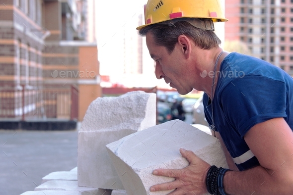 ↟ Building a house from a gas block or foam block. Construction and renovation concept