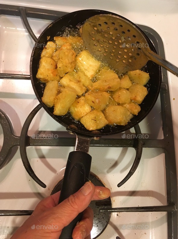 Frying cassava (yuca) in olive oil. A healthier alternative to fried