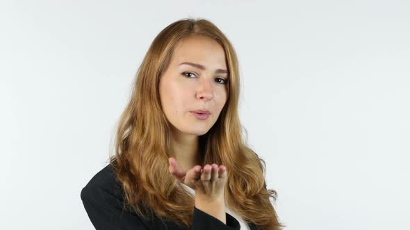 Businesswoman Giving Flying Kiss , White background alt