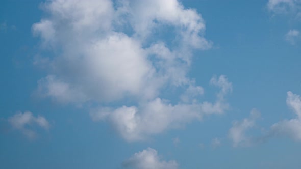 Clouds Flying in Blue Sky, Timelapse. alt