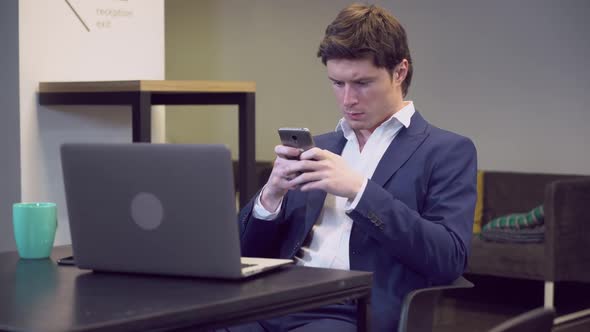 Young Male Send Mail Use Cell alt