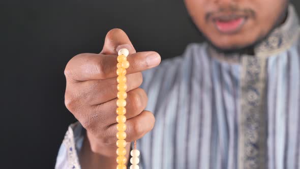 Muslim Man Praying During Ramadan, Close Up  alt