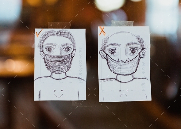 Two drawings displaying right and wrong way to wear a face mask during COVID-19 pandemic
