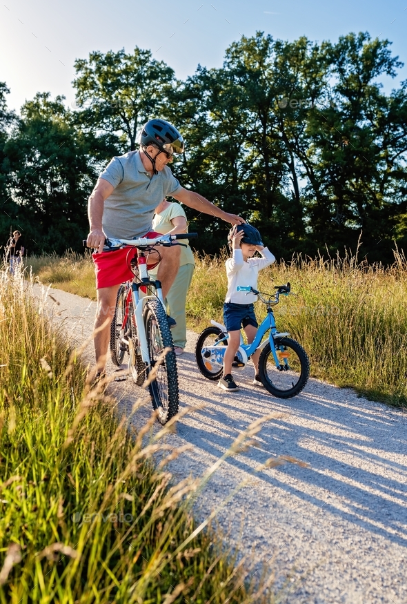 Happy Little Boy Riding a Bike Stock Image - Image of lifestyle