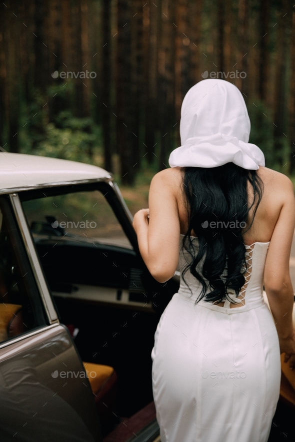vintage woman in retro car - Stock Photo - Images