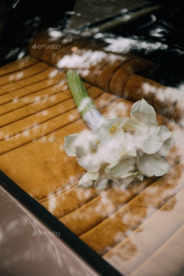 Flowers in vintage car - Stock Photo - Images