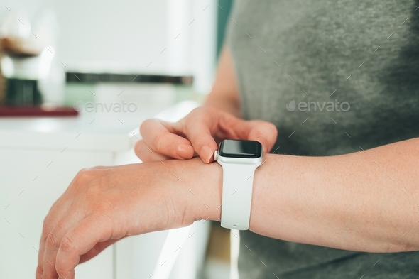 Apple watch on the girl's hand - Stock Photo - Images
