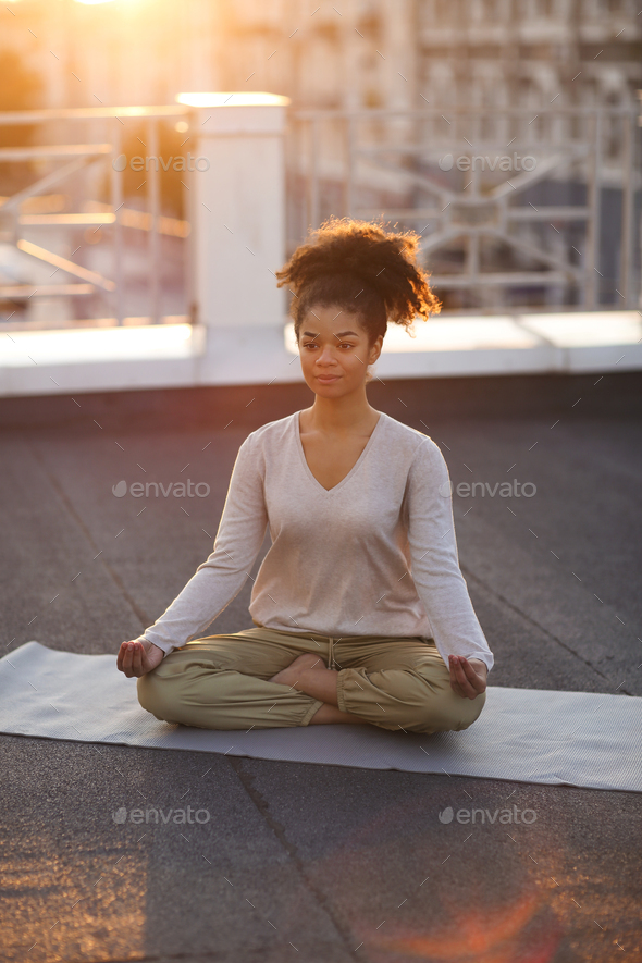 Yoga Woman in Meditation Sitting in Lotus Pose Female Meditating