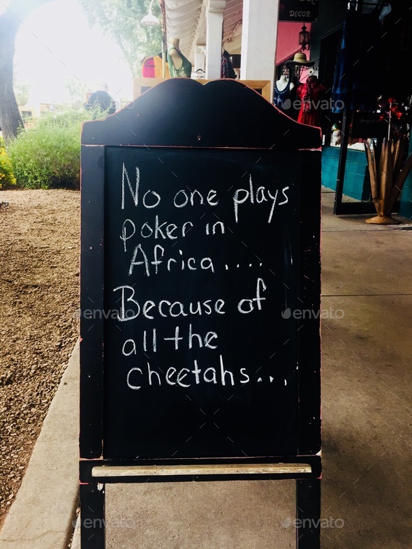 Chalkboard sign outside small business