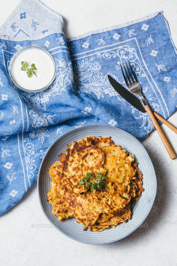 Potato pancakes Latkes on white table. Traditional Jewish festive food