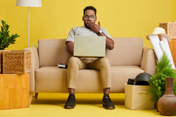 Man Reading Shocking News - Stock Photo - Images