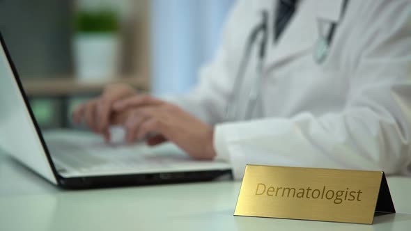 Professional Dermatologist Chatting With Patient on Laptop, Online Consultation alt