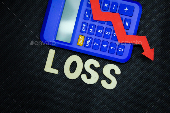 red arrow and calculator with the word loss.