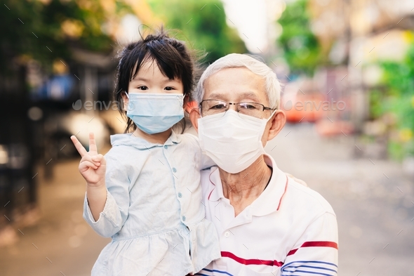 Family wear masks to prevent spread of new virus.