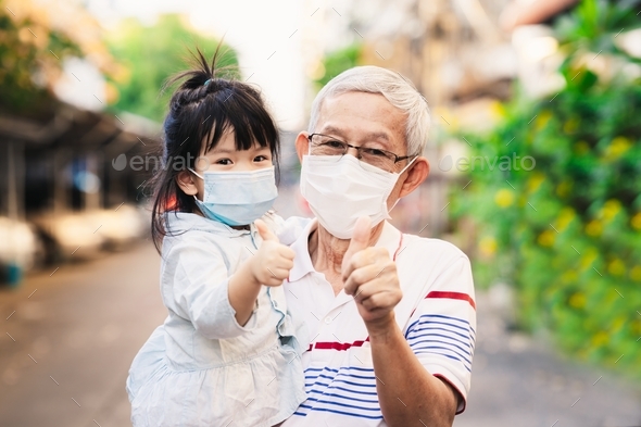 Family wear mask to prevent spread of coronavirus.