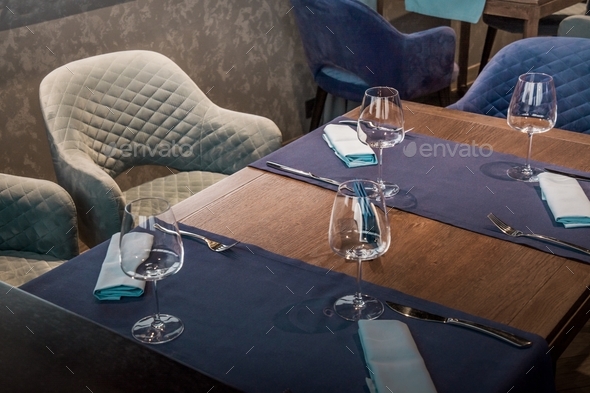Beautiful table setting in anticipation of guests in the restaurant or cafe