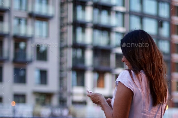 Social media, woman using a smartphone