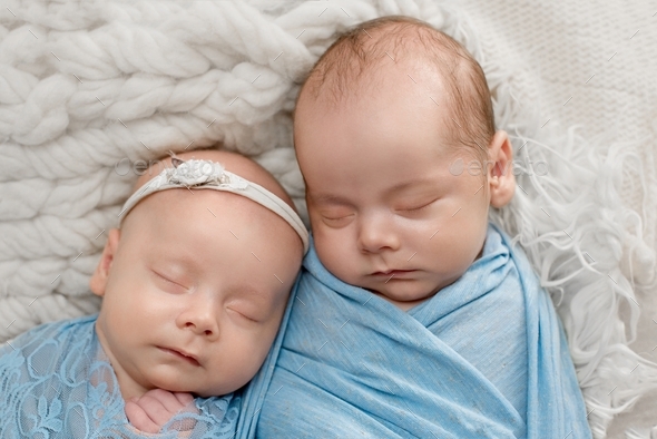 Twins Newborn babies. Emotions of children. Brother and sister Stock ...