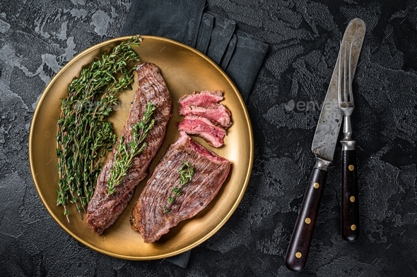 BBQ Grilled Bavette Bavet Beef Meat Steak With Herbs On A Plate. Black ...