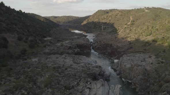 Pulo do Lobo waterfall drone aerial view in Alentejo, Portugal alt