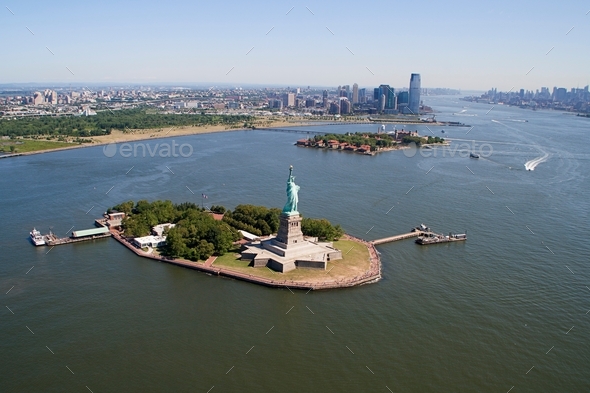 New York landscape with the Statue of Liberty in Liberty Island, aerial view from helicopter