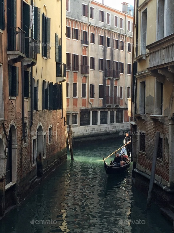 Gondola in a Venice canal - Stock Photo - Images