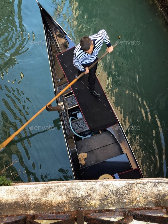 Travelling in a Venice gondola - Stock Photo - Images