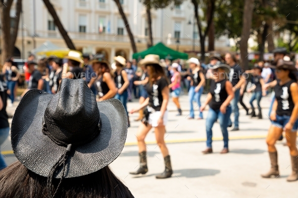 Black hat on flash mob background