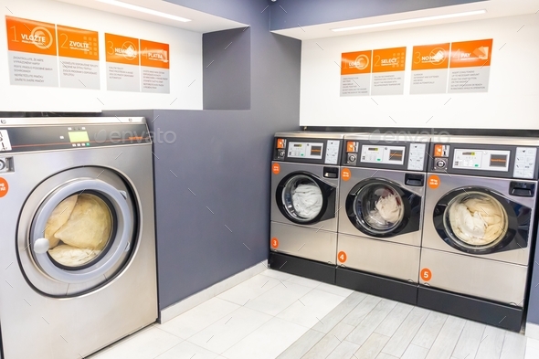 A downtown rise laundry room with Speed Queen front load washers and dryers in Prague, Czech Republi