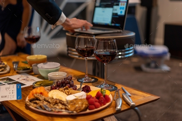 Cheese and Wine at home with friends, getting ready to watch a zoom call together during lockdown